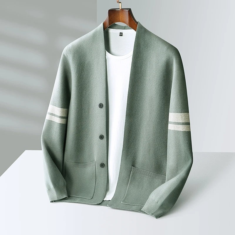 Modern men's layering piece: a lightweight cardigan with convenient pockets and a chic button front.