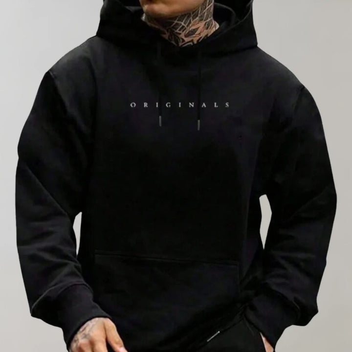 Comfortable men's oversized pullover hoodie, a trendy choice for relaxed modern menswear & casual outfits.
