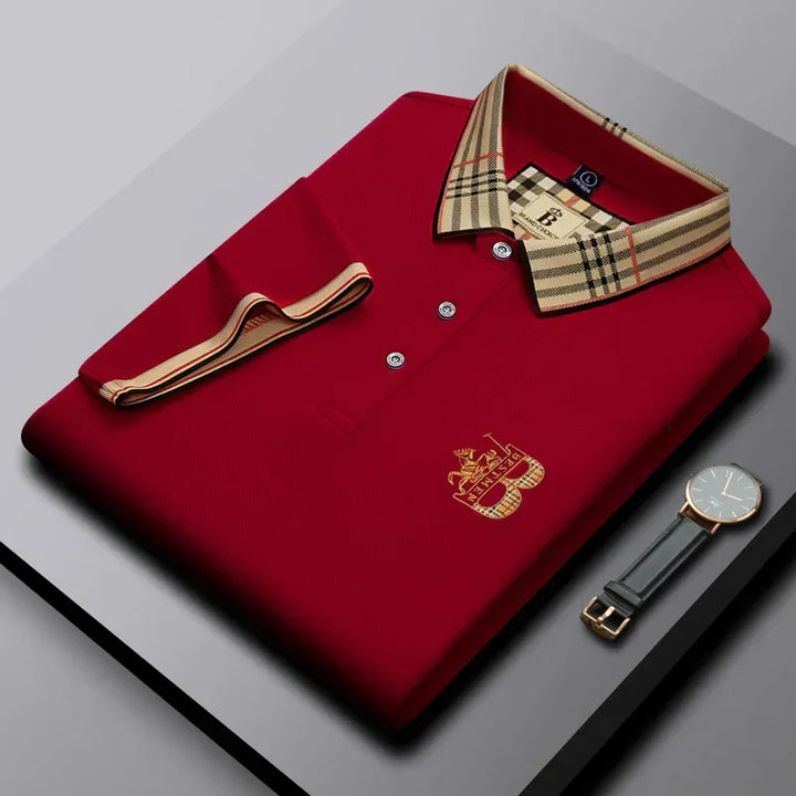 Men's short-sleeve collared polo shirt displayed on a hanger, highlighting its classic fit and stylish design.