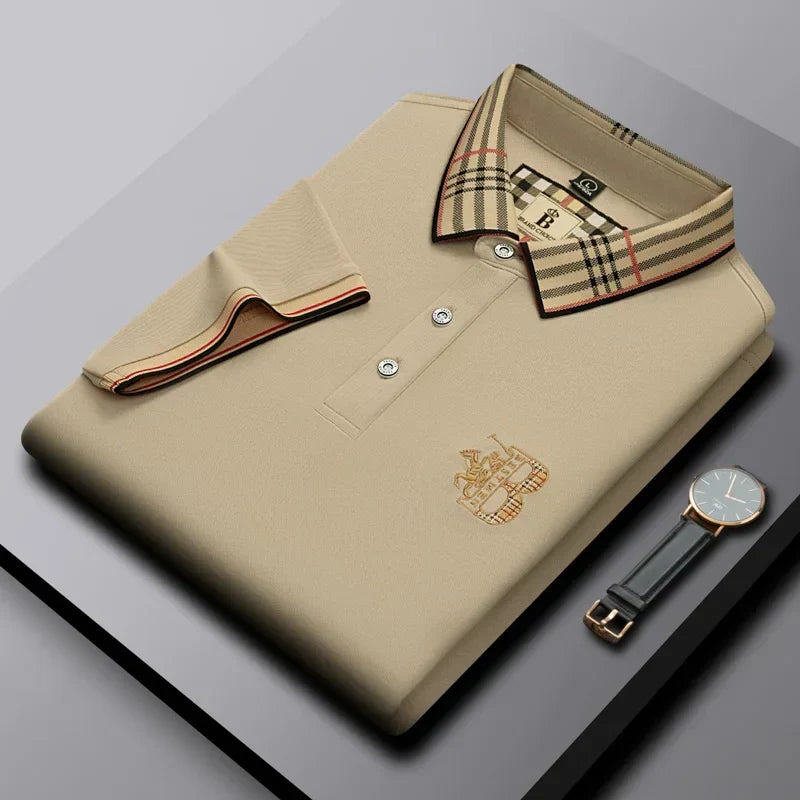 Man wearing a men's short-sleeve polo shirt paired with chinos for a smart casual, comfortable look.