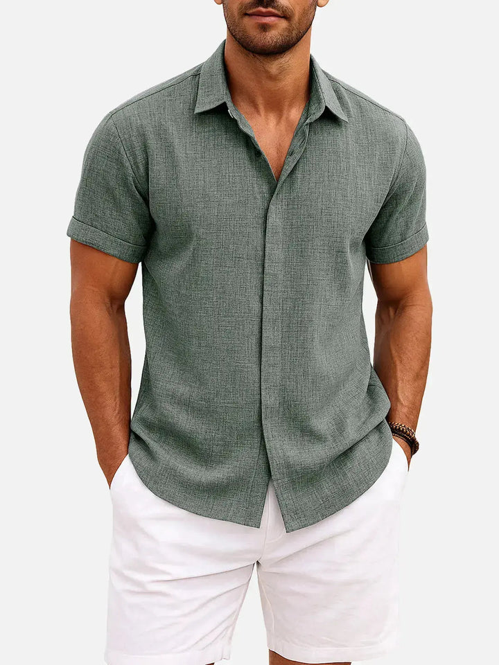 Versatile men's short sleeve collared shirt with stylish textured design.