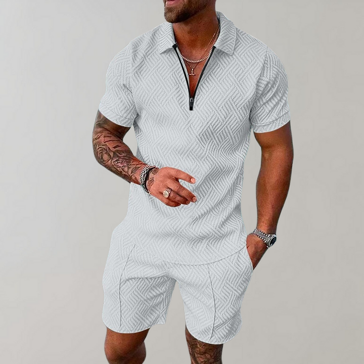 Men's short sleeve polo shirt and coordinating shorts outfit, ideal for a smart casual summer ensemble.