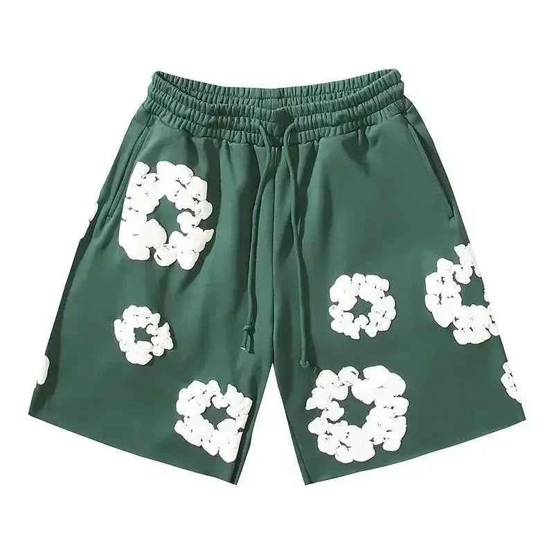 Bold floral print men's summer shorts, essential for stylish streetwear and festival looks.