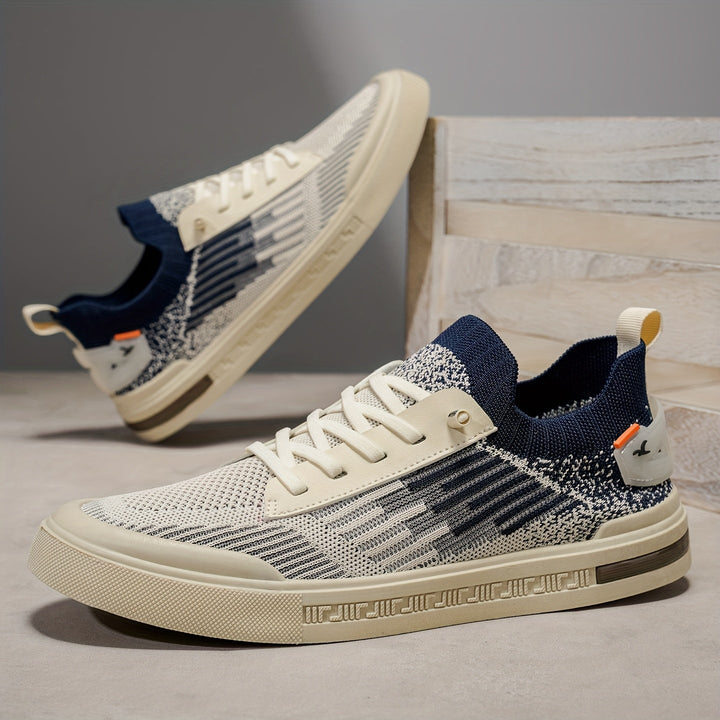 Close-up of men's knit sneakers, showcasing breathable fabric and comfortable design. Perfect for streetwear.