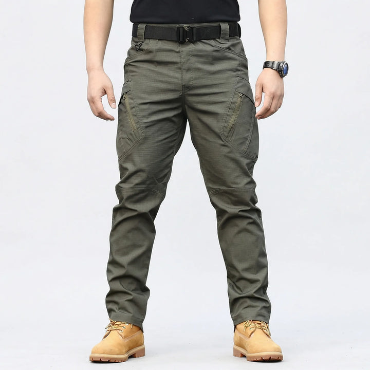 Versatile men's tactical adventure pants. Multi-pocket cargo design, durable for hiking, camping & travel.