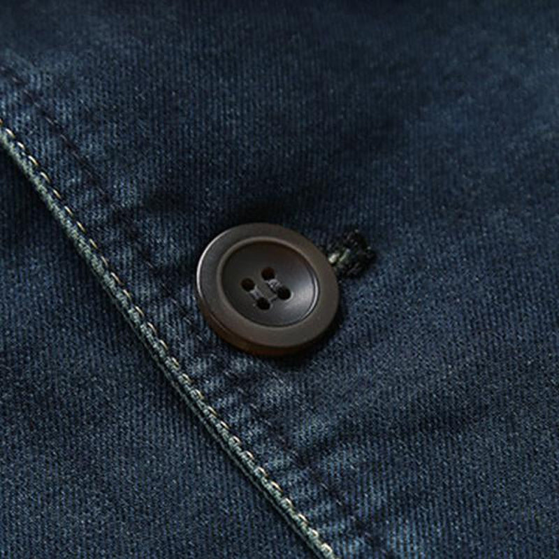 Deep blue men's tailored casual blazer, perfect for smart-casual events, featuring practical pockets & a modern fit.