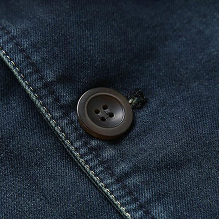 Deep blue men's tailored casual blazer, perfect for smart-casual events, featuring practical pockets & a modern fit.