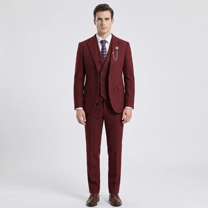 Detailed view of the intricate herringbone pattern on men's tailored fit suit fabric, highlighting quality & style.