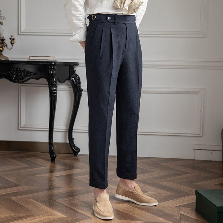 Men's tailored high-waist pleated trousers. Modern straight leg dress pants for smart-casual & office wear.
