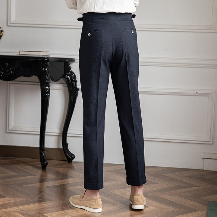 Stylish men's high-waist pleated trousers with a tailored fit. Perfect straight leg dress pants for work.