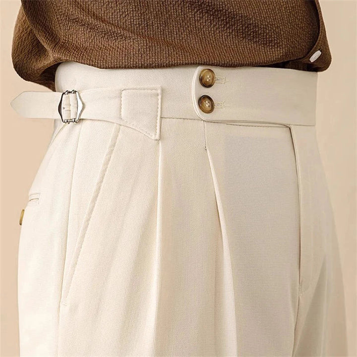 Men's tailored high-waisted trousers with side buckle. Perfect for business or smart casual wear.