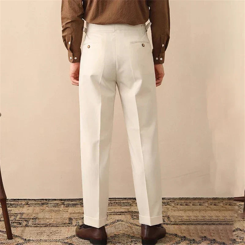 Chic men's high-waisted tailored fit trousers, ideal for formal or smart casual occasions. Features side buckle.