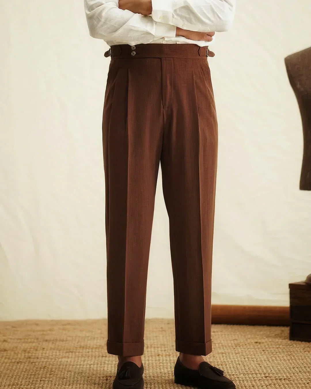 Premium men's tailored high-waisted dress pants, featuring a refined side buckle. Essential business wear.