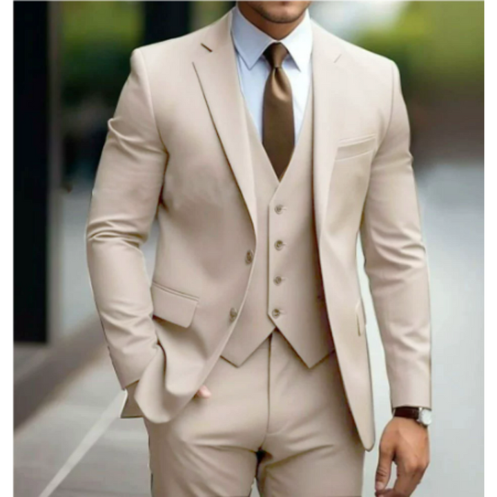 Close-up of men's tailored suit jacket, highlighting lapels and slim-fit design.