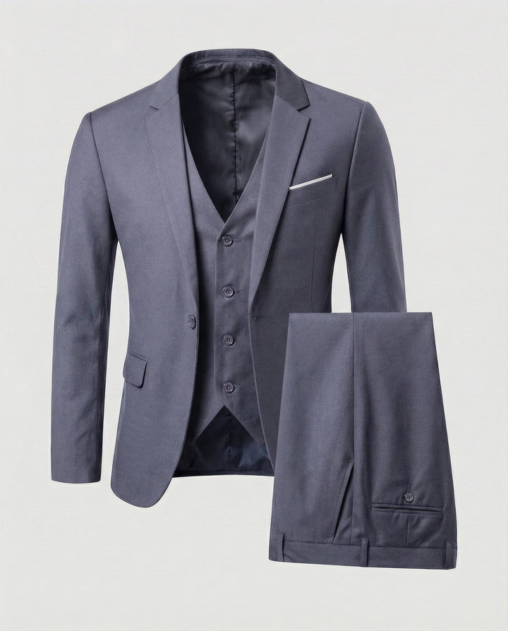 Sophisticated navy men's tailored three-piece suit. Perfect formal wear for business, weddings, or prom.