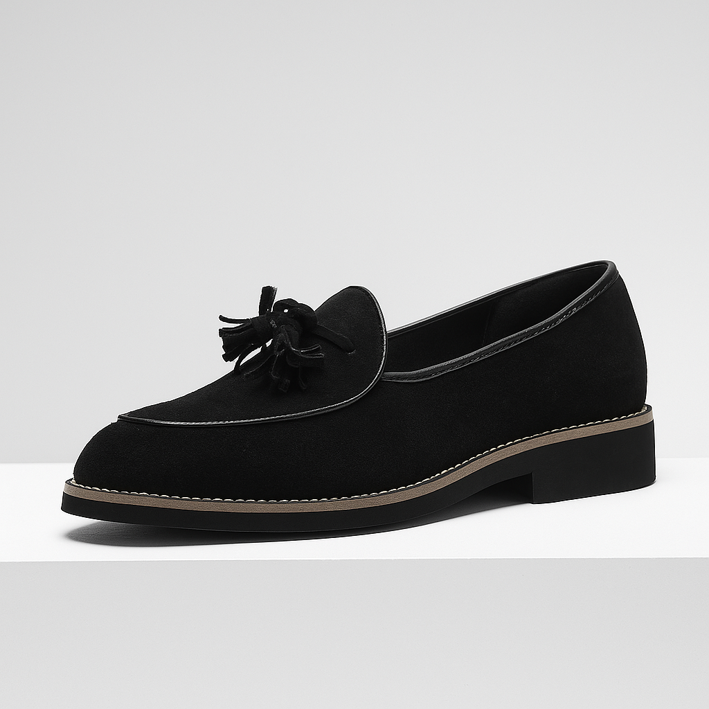 Stylish men's black suede tassel loafers, a versatile choice for dress shoes or smart casual outfits.