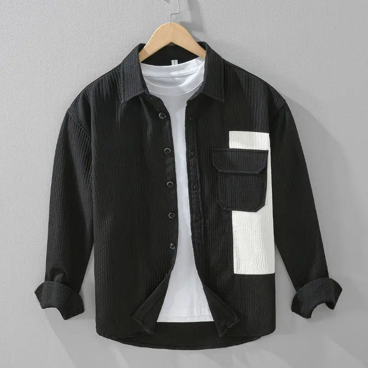 Men's casual button-up shirt, classic black with subtle texture and contrast patch on pocket