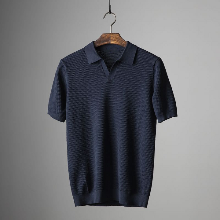 Fashionable men's comfort fit textured polo shirt, ideal for a smart casual summer outfit.