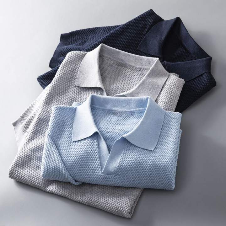 Stylish men's textured short sleeve polo shirt, featuring a geometric pattern for summer casual fashion.