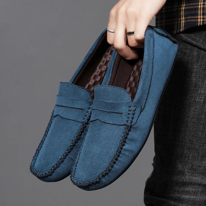 Men's Tivoli black leather penny loafers, classic slip-on dress shoes for comfort and style.