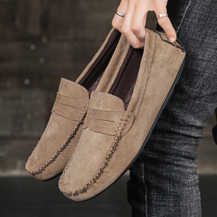 Stylish men's Tivoli leather slip-on loafers, perfect for classic dress shoes or smart casual everyday footwear.