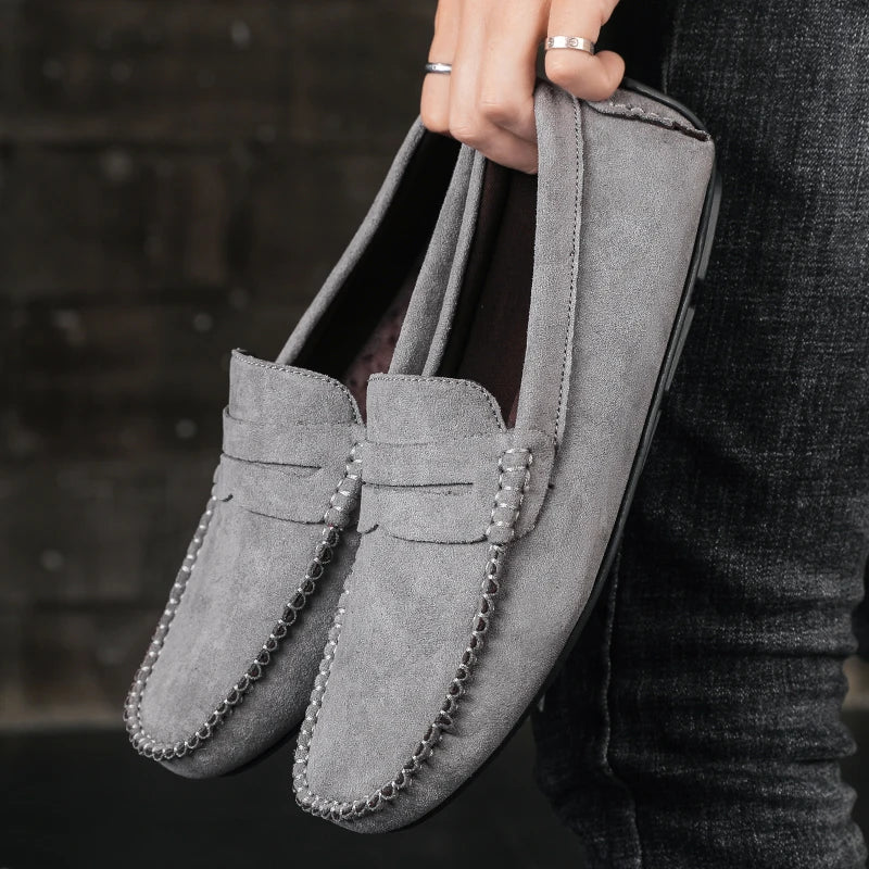 Black men's Tivoli leather penny loafers, classic slip-on dress shoes, ideal for formal or smart casual outfits.