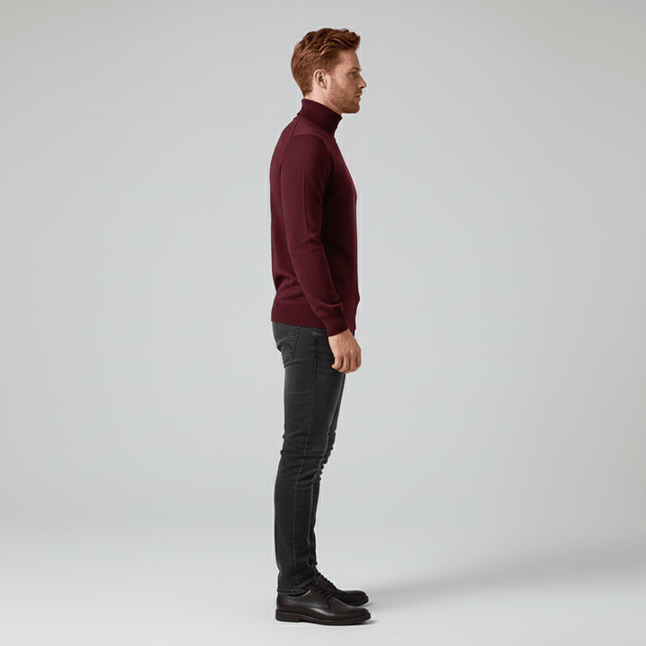 Model wearing a men's slim-fit turtleneck sweater (Toby) as a smart office wear option.