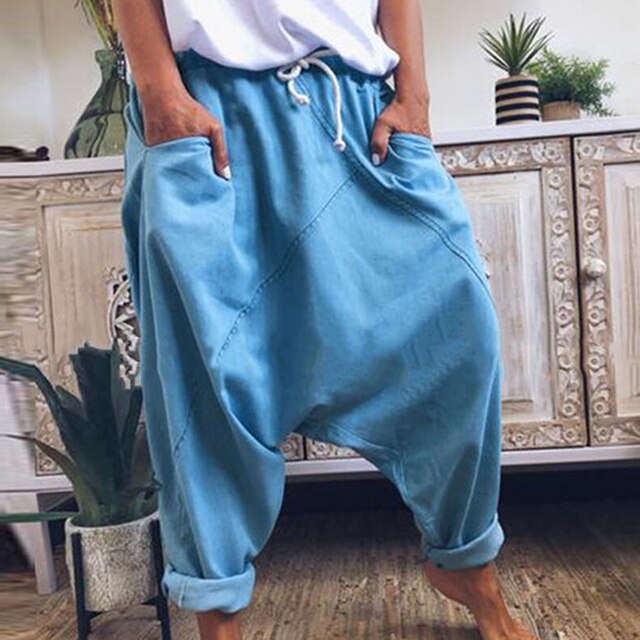 Fashionable men's bohemian harem trousers, loose fit streetwear for a trendy casual look.