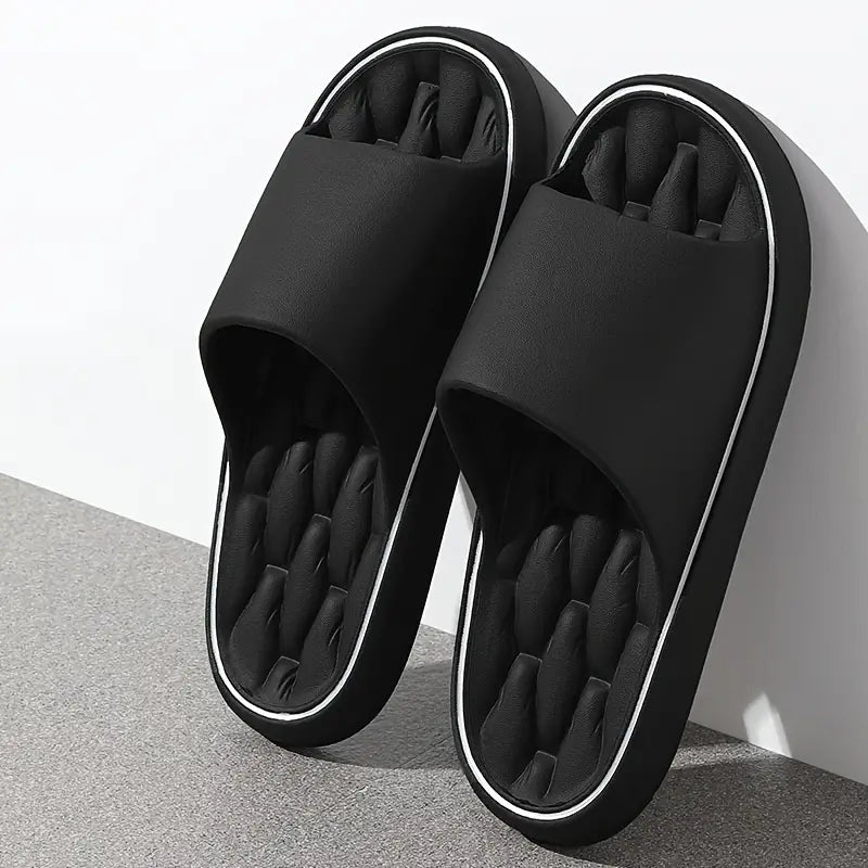 Men's ultra-comfort black pillow slides, offering cloud-like foot support and cushioning for indoor/outdoor wear.
