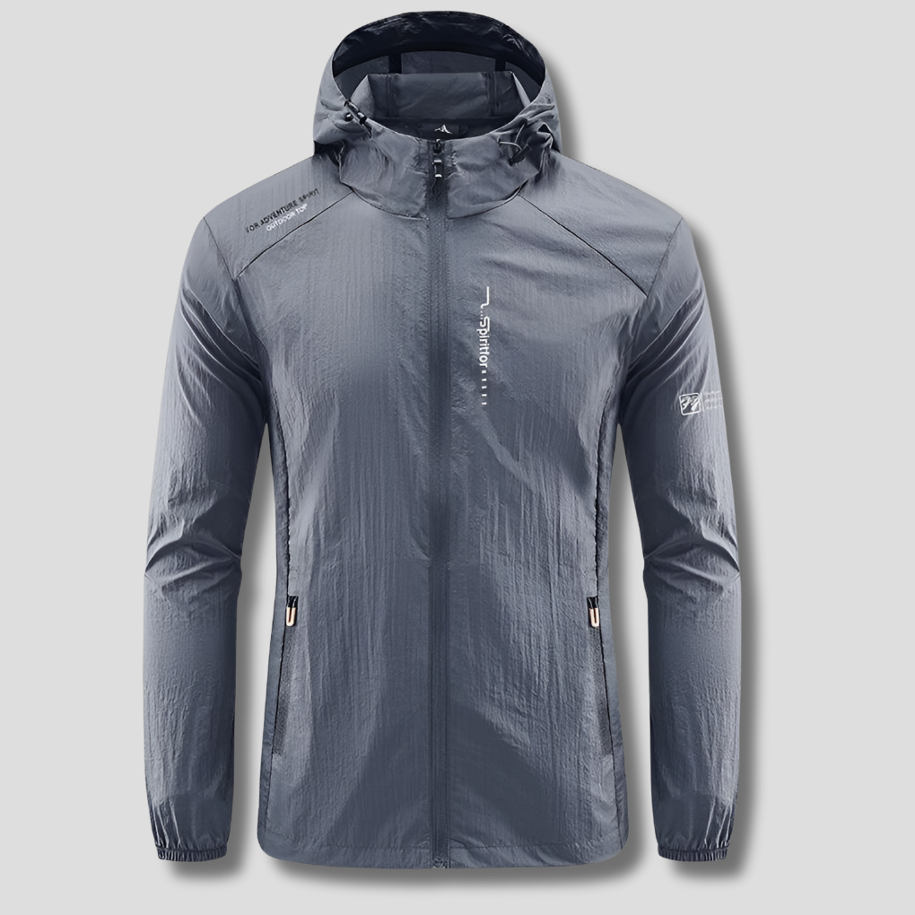 Active man wearing a lightweight hooded jacket, perfect for sun & wind protection during outdoor activities.