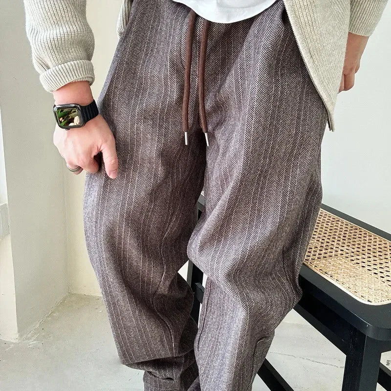 Effortlessly stylish gray Urban Drift men's pants. Relaxed fit, adjustable waist for everyday comfort & modern fashion.