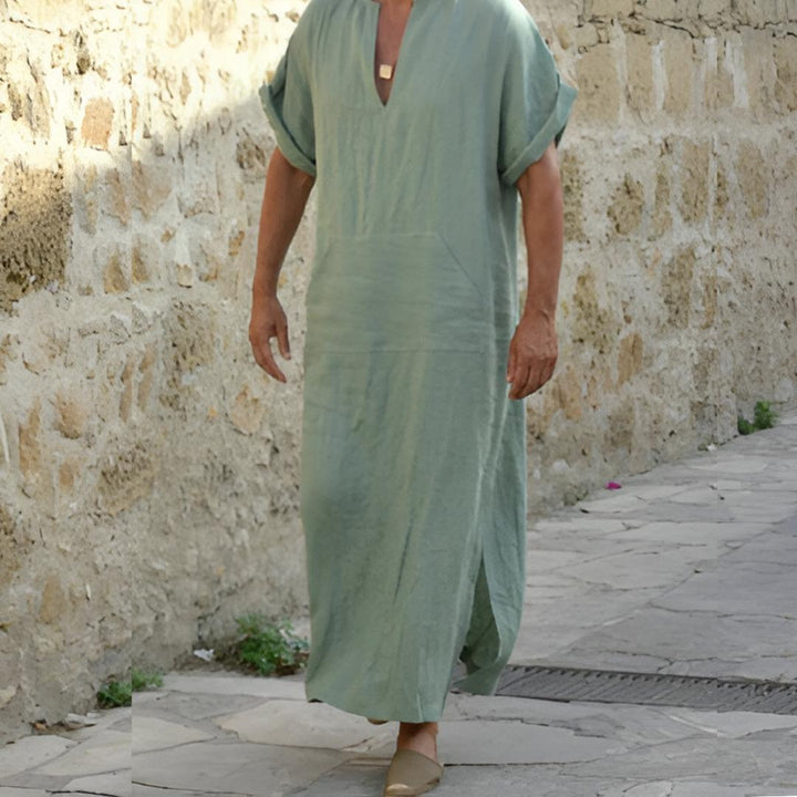 Men's casual V-neck long shirt with side slits. A comfortable, versatile top for everyday modern fashion.