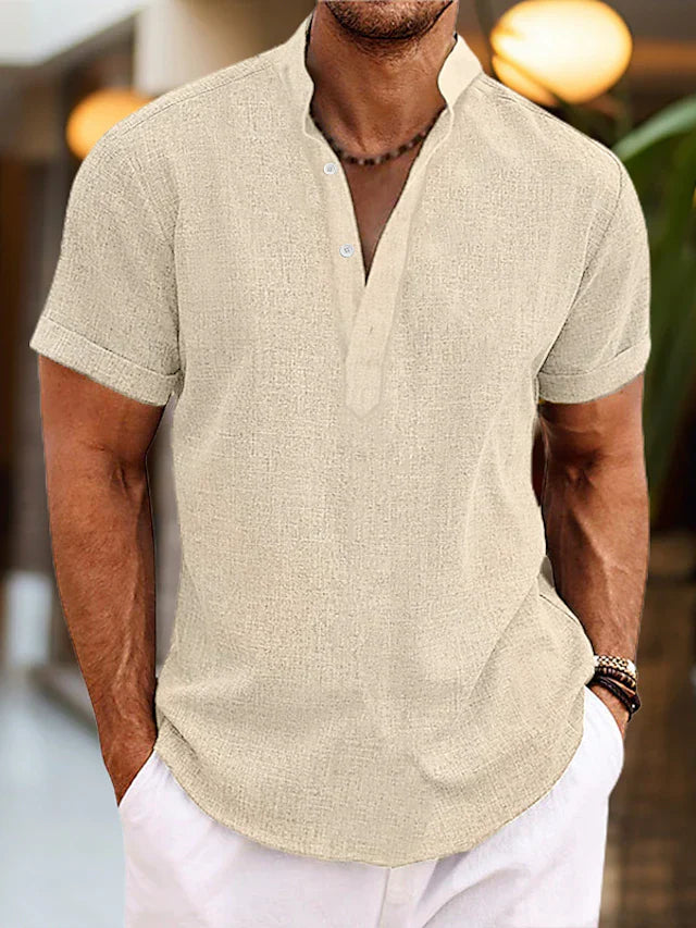 Casual men's V-neck polo shirt, short sleeve, regular fit. Features a classic button placket for a clean look.