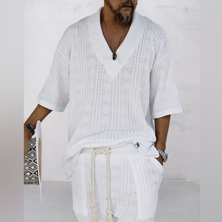 Stylish men's summer outfit: V-neck shirt & matching shorts set. Comfortable two-piece casual wear.