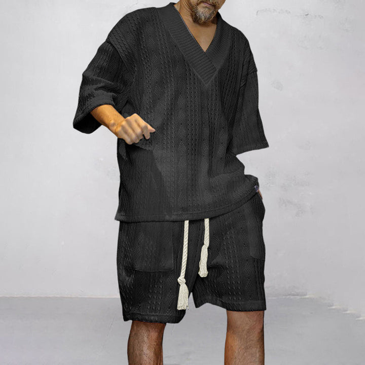 Men's comfortable lounge wear set: V-neck shirt and shorts. Relaxed fit, perfect for home & summer casual.