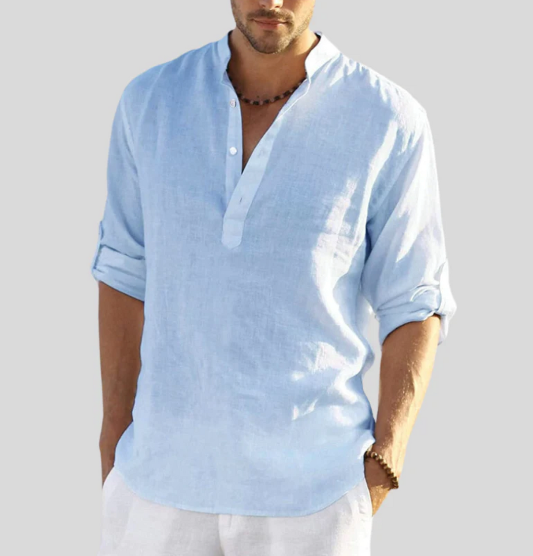 Close-up of buttons and V-neck on a stylish men's short sleeve shirt, ideal for summer casual wear.