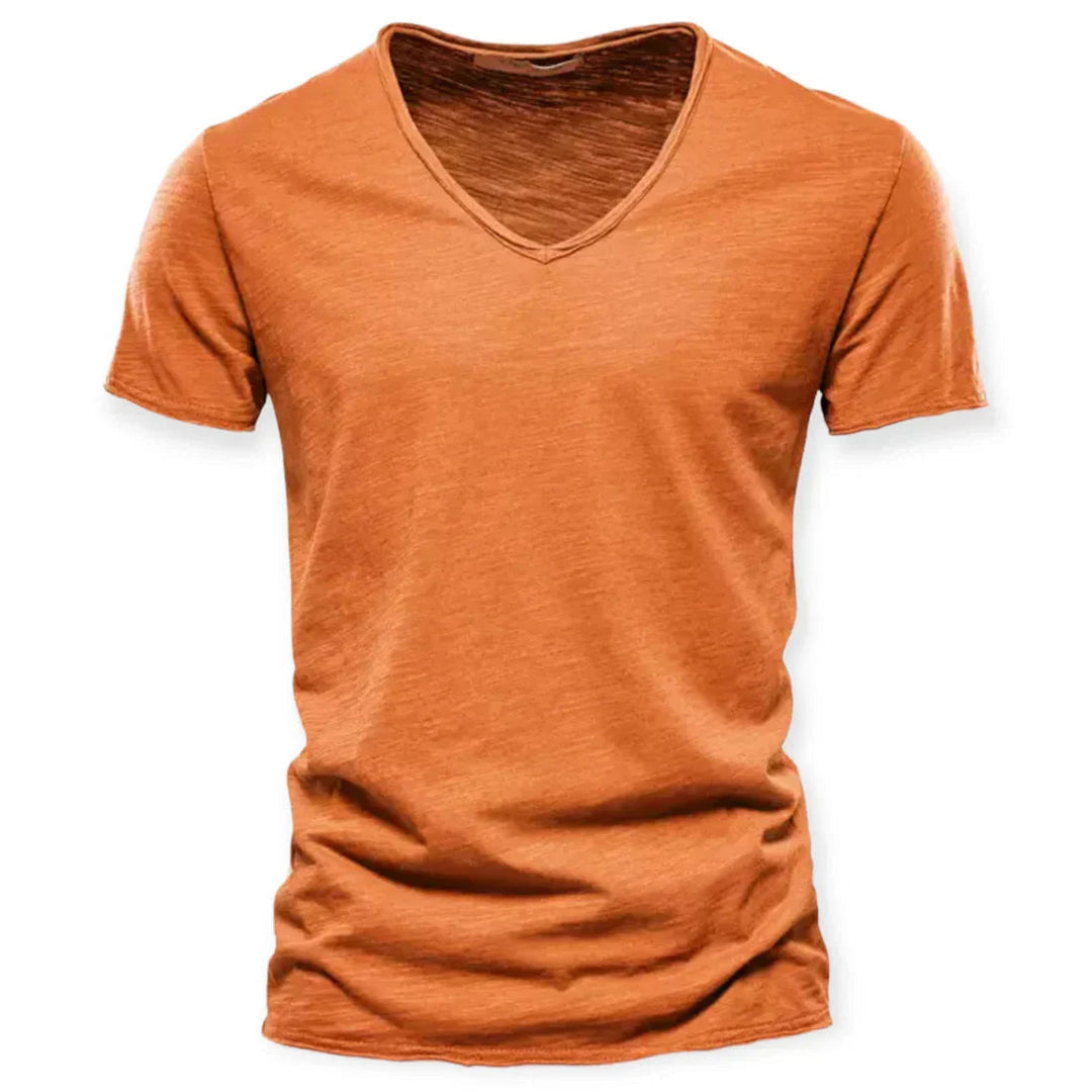 Breathable men's V-neck t-shirt, soft fabric for comfortable summer wear and relaxed fit style.