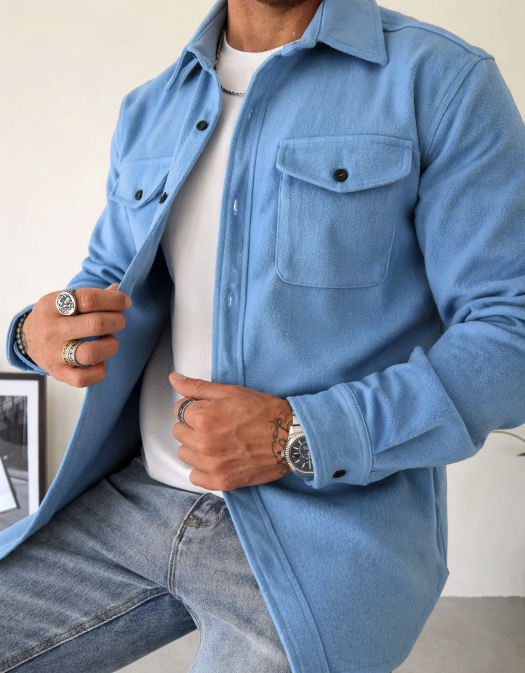 Functional men's button-up overshirt jacket, great for layering with convenient chest pockets.