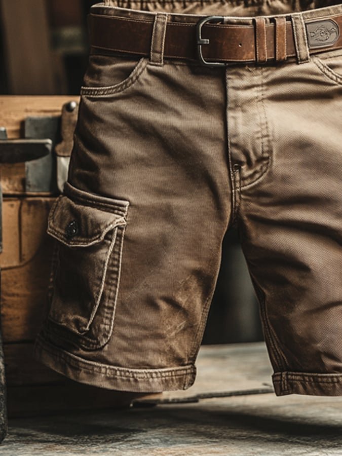 Rugged men's multi-pocket cargo shorts, vintage style, offering comfort and utility for outdoor activities & casual wear.