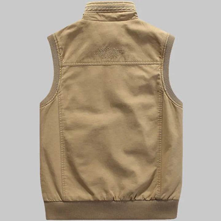 Men's vintage multi-pocket outdoor vest for fishing, hiking, & travel. Khaki green utility style adventure gear.