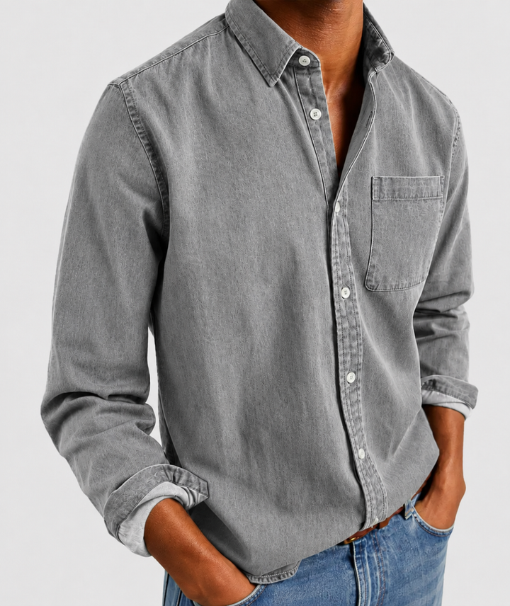 Detailed view of men's vintage style long sleeve button shirt with classic cuffs. Everyday wear.