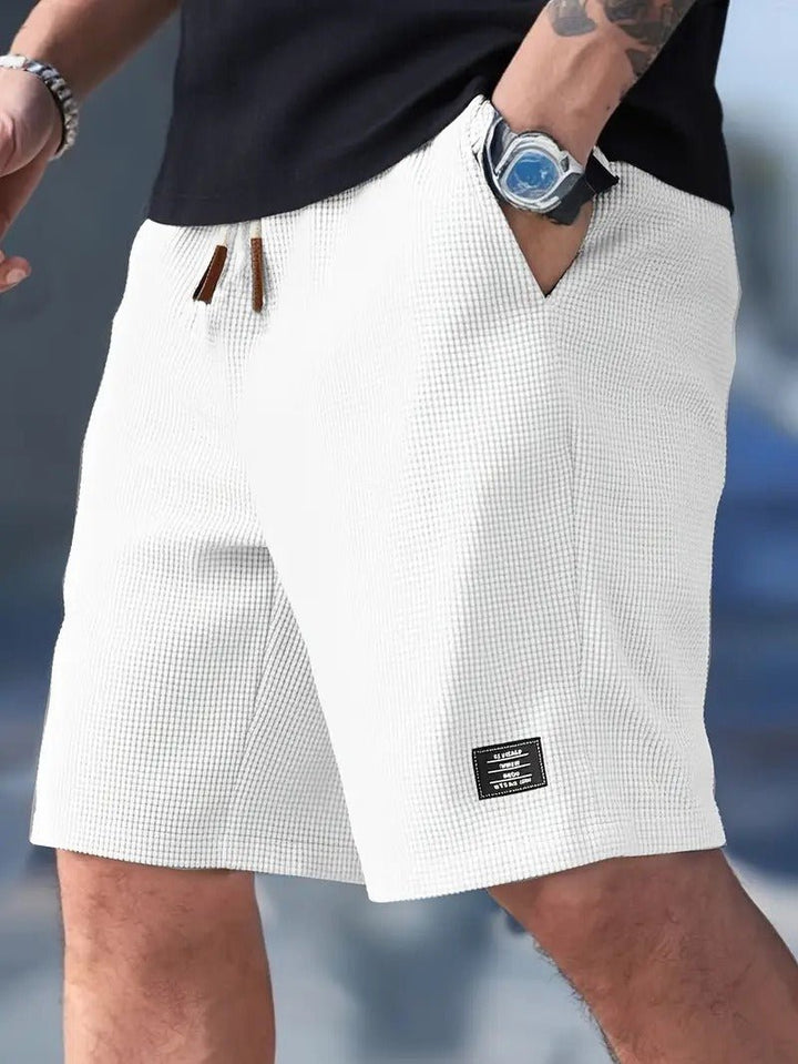 Men's stylish waffle knit relaxed fit shorts for ultimate summer comfort and versatile everyday wear.