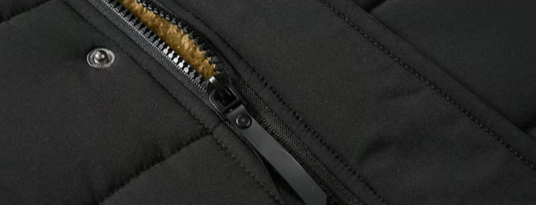 Men's fashion outerwear: a stylish fur-lined winter parka in an outdoor setting