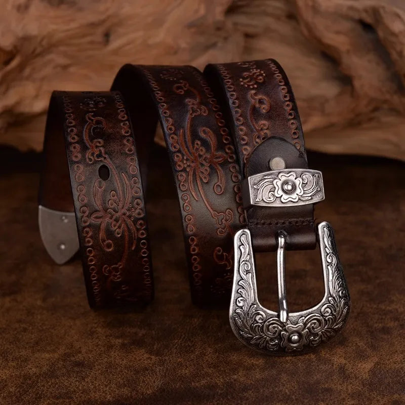 Stylish men's leather western belt with an intricately engraved metal buckle, suitable for casual fashion.