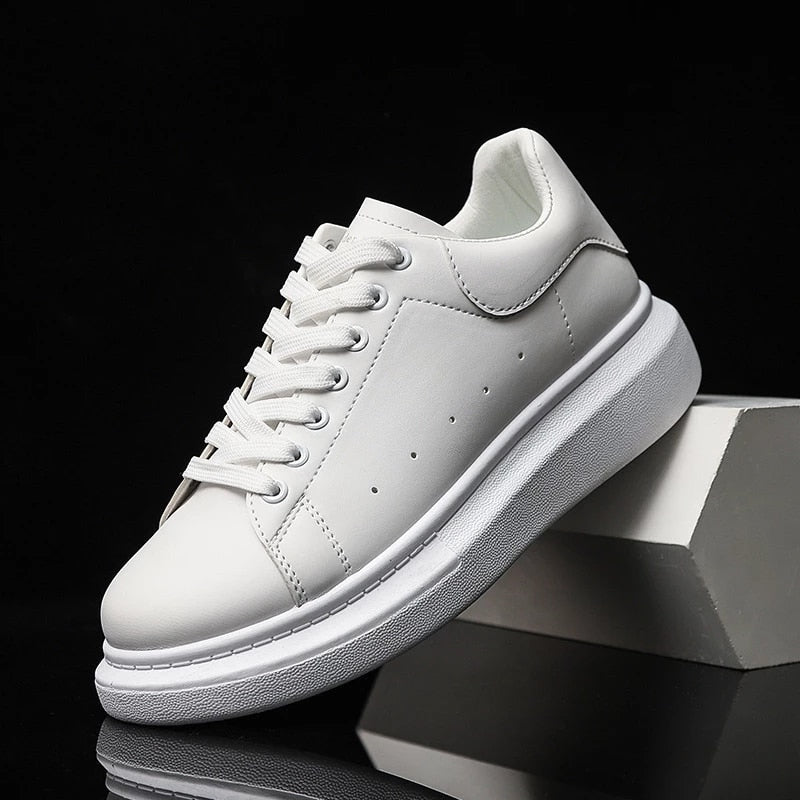 Black men's platform sneakers with lace-up closure. Trendy, comfortable casual shoes for modern everyday style.