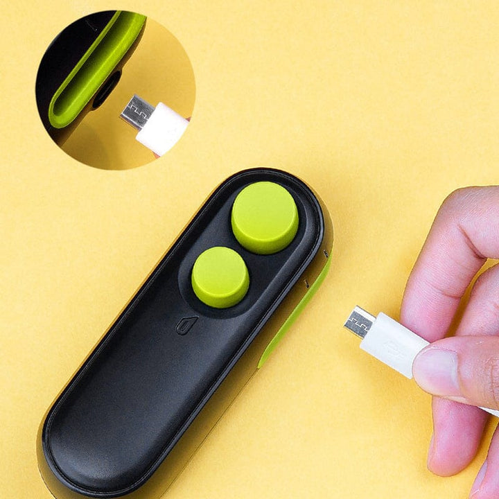 Kitchen counter with the mini handheld USB rechargeable bag sealer, ready for food preservation tasks