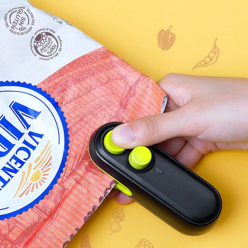 Portable USB rechargeable bag sealer sealing a pack of cookies, demonstrating its snack sealer use