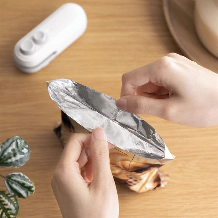 USB rechargeable chip bag sealer with cutter, a versatile kitchen gadget for food storage solutions
