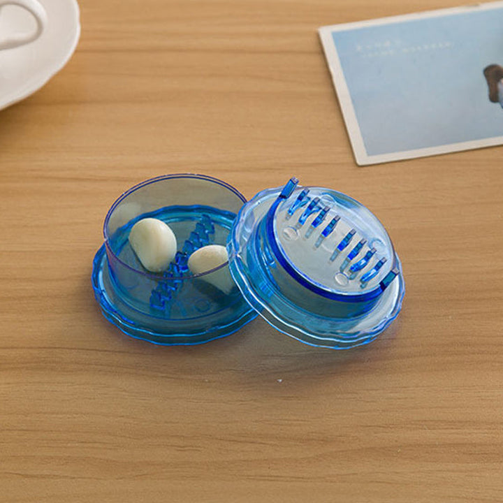 Garlic press tool with easy-to-clean design, a must-have kitchen accessory for cooking