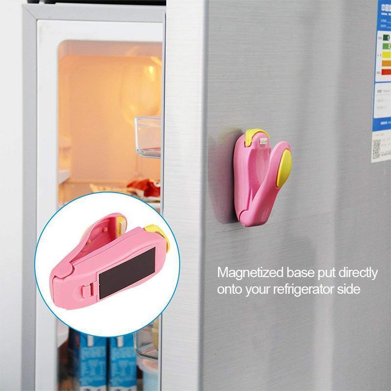 A person using a mini food sealer to re-seal an open bag of chips, highlighting convenience and freshness.